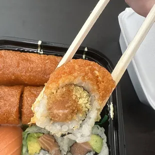 Inside of spicy salmon crunch roll