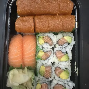Spicy salmon crunch roll (top), salmon avocado roll (bottom right), 2 salmon sushi (bottom left)