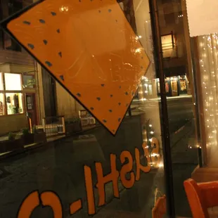 a sign in the window of a restaurant