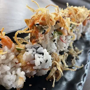 a close up of a plate of sushi