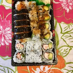 Three sushi rolls: California $4.50, Eel Avocado $5.50, Rock &amp; Roll $6.95,