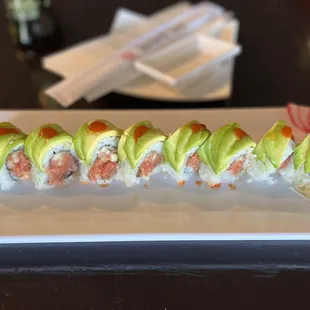 a sushi roll with avocado