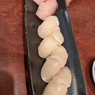 a plate of sushi on a table