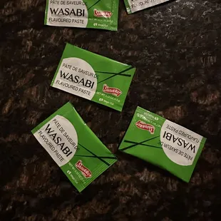 Delivery with packaged wasabi and spilled miso soup.