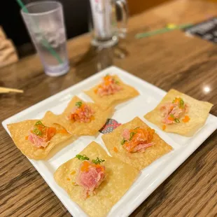 a plate of sushi rolls