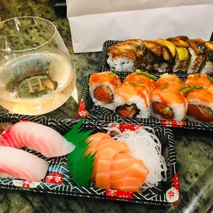 red snapper nigiri, salmon, sashimi, crybaby 2 and a dragon roll.