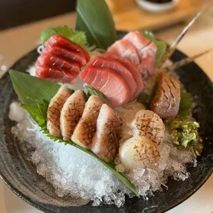 a plate of sushi on ice