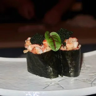 The Canadian Crab sushi pieces were topped with black caviar &amp; garlic butter.