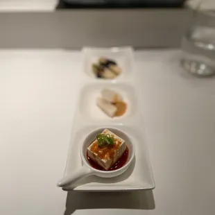 Omakase appetizer - silken tofu made in house, radish, and brussel sprouts in yuzu soy sauce