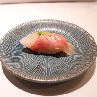 Japanese grouper topped with shaved yuzu