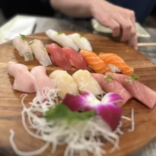 sushi on a wooden plate