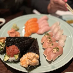 Combination of Salmon , Yellowtail , Albacore , Red snapper and hand rolls