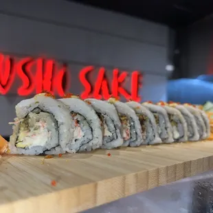 a sushi roll on a cutting board
