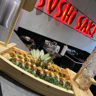 a sushi boat on display