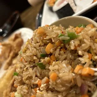 Fried rice, tempura seafood, yellowtail roll, chef special roll