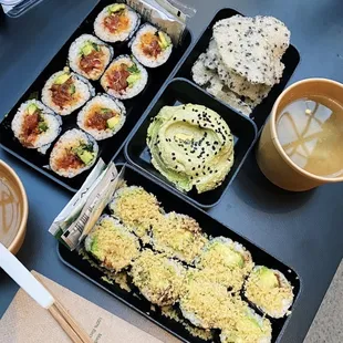 a variety of sushi and a cup of coffee