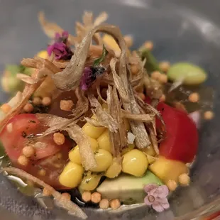 a plate of food with a variety of vegetables