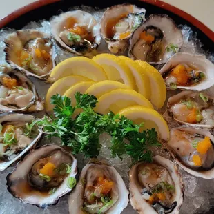 Kumamoto oyster presentation, vibrant flavors and colors