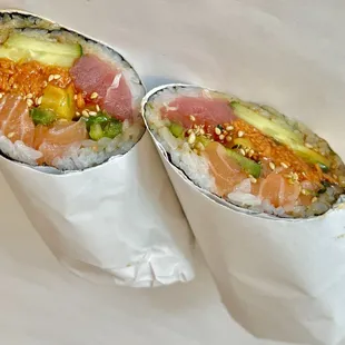 BYO SUSHI BURRITO W/ 2 Protein:
salmon, ahi tuna, unagi sauce, cucumber, takuan(pickled radish), jalapeño, cucumber, carrots, sesame seeds.