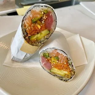 BYO SUSHI BURRITO W/ 2 Protein:
salmon, ahi tuna, unagi sauce, cucumber, takuan(pickled radish), jalapeño, cucumber, carrots, sesame seeds.