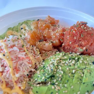 BYO POKE BOWL W/ 2 protein:
White rice, cucumber, crab salad, salmon, spicy tuna, soy, poke, spicy mayo, avocado, furikake.