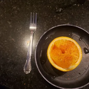 Fresh orange served after meal. I had my Tajin ready and available.