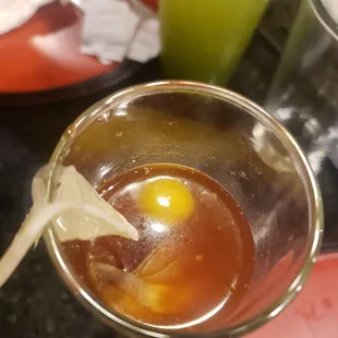 Oyster shooter w/ quail eggs, masago eggs.