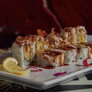 a plate of sushi on a table