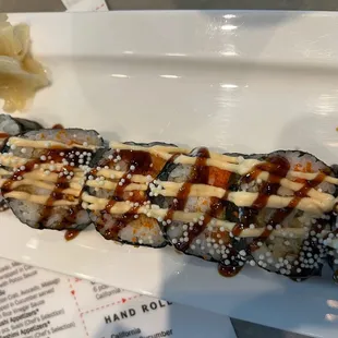 a piece of sushi on a plate