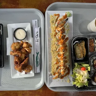 Salmon hand roll, karaage, hot night roll, and pork belly bento box