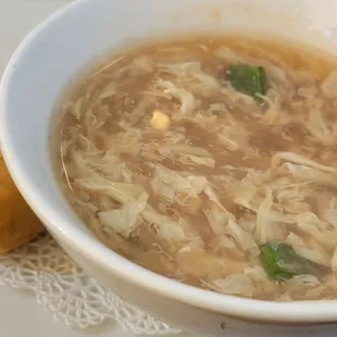 Soup and egg roll was part of lunch meal