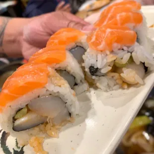 I forgot what this was called but it was good, under the Fresh Rolls on menu and has raw salmon and scallops