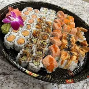 a plate of sushi on a table