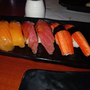 a plate of sushi on a table