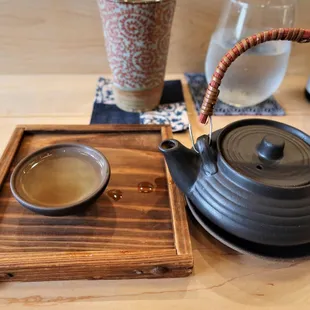 a teapot and a cup of tea