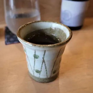 a cup of coffee on a table