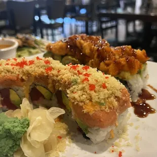 Angry Tuna Roll (closest to you) and Volcano Scallop Roll (in the background).