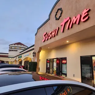 the outside of a sushi time restaurant