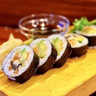 Davis Roll: 5 pieces. Salmon, eel, avocado, cucumber and masago, topped with eel sauce.