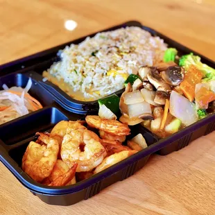 Shrimp Hibachi Lunch: Shrimp, fried rice, veg (mushroom, onion, zucchini, broccoli, carrot), radish salad, served w. hibachi sauces.