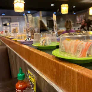 Revolving sushi.