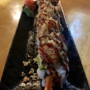 Mazey Roll - cucumber, crab meat, shrimp tempura, spicy tuna, avocado layers topped with tempura crunch and house sauce