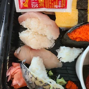 Dont get sushi here. Unseasoned sushi rice, unfresh sashimi. Look at that saba. It just looks like it came from hell or canned Mackerel.