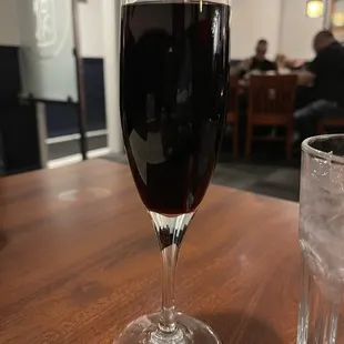 A Cabernet Sauvignon served in a champagne flute