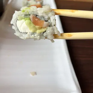 TINY amount of salmon for $11 on the Philly roll.