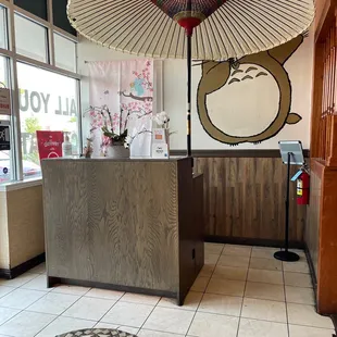 the front desk of a sushi restaurant