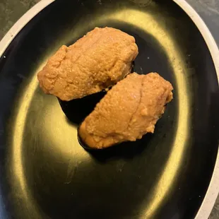 Uni nigiri $13