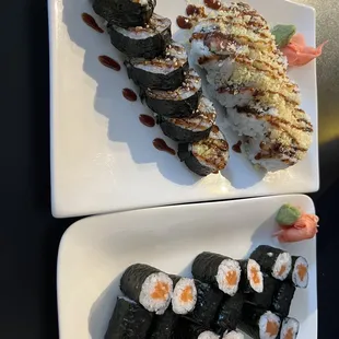 two plates of sushi with sauce