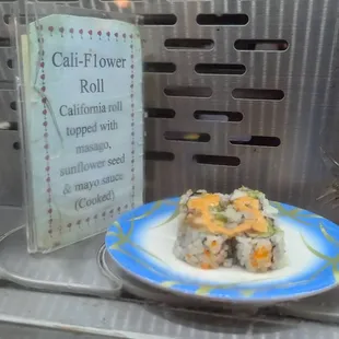 Each section has a small sign telling you what is on the plate as it rolls by.