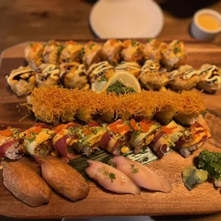 From top to bottom: Pink Lady, Roll, Volcano Roll, Chewbacca Roll, Tuna Deluxe, Fried Tofu Nigiri, YellowTail Nigiri,